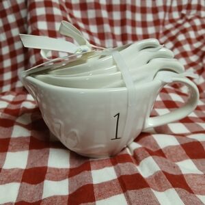 Rae Dunn Cream Ceramic Measuring Cups with Black Numbering